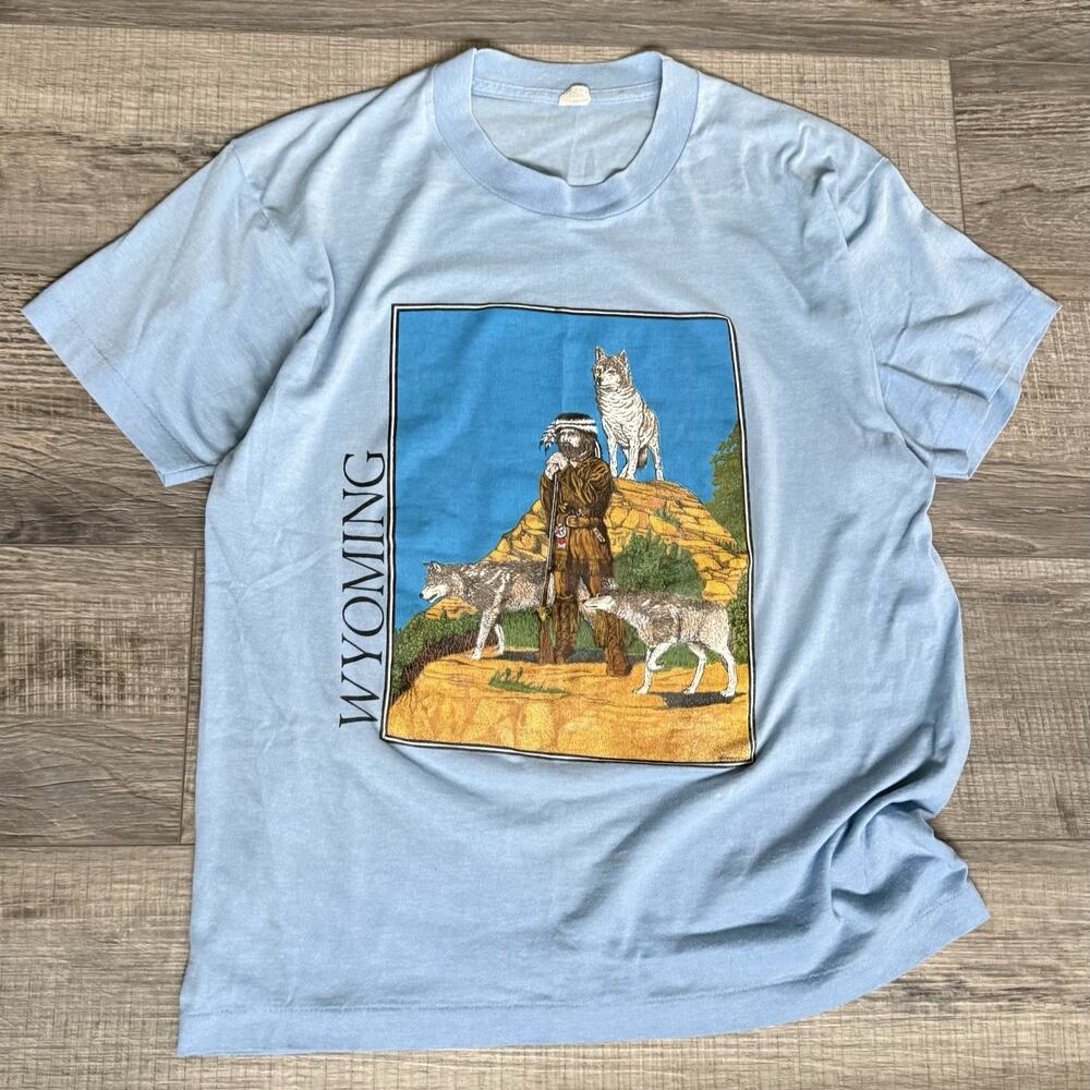 Vtg 90s Wyoming TShirt Size Large Screen Star USA Faded Light Blue Frontier Wolf